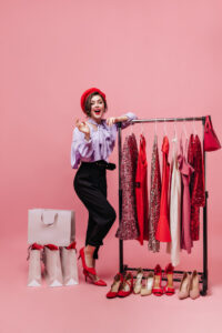 full-length-shot-elegant-lady-red-hat-black-purple-outfit